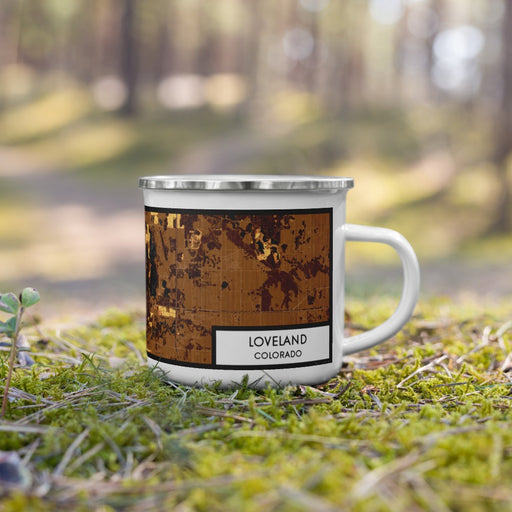 Right View Custom Loveland Colorado Map Enamel Mug in Ember on Grass With Trees in Background