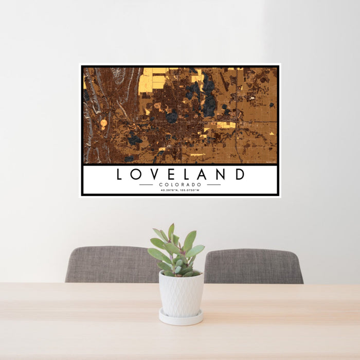 24x36 Loveland Colorado Map Print Landscape Orientation in Ember Style Behind 2 Chairs Table and Potted Plant