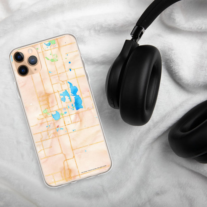 Custom Loveland Colorado Map Phone Case in Watercolor on Table with Black Headphones
