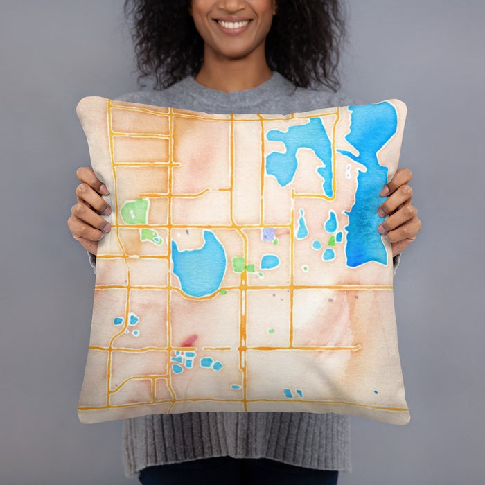 Person holding 18x18 Custom Loveland Colorado Map Throw Pillow in Watercolor