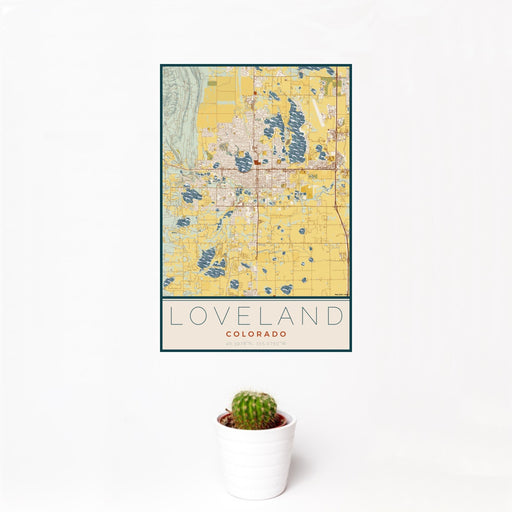 12x18 Loveland Colorado Map Print Portrait Orientation in Woodblock Style With Small Cactus Plant in White Planter