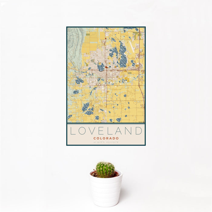 12x18 Loveland Colorado Map Print Portrait Orientation in Woodblock Style With Small Cactus Plant in White Planter