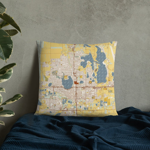 Custom Loveland Colorado Map Throw Pillow in Woodblock on Bedding Against Wall