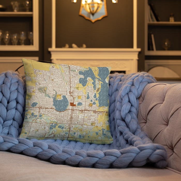 Custom Loveland Colorado Map Throw Pillow in Woodblock on Cream Colored Couch