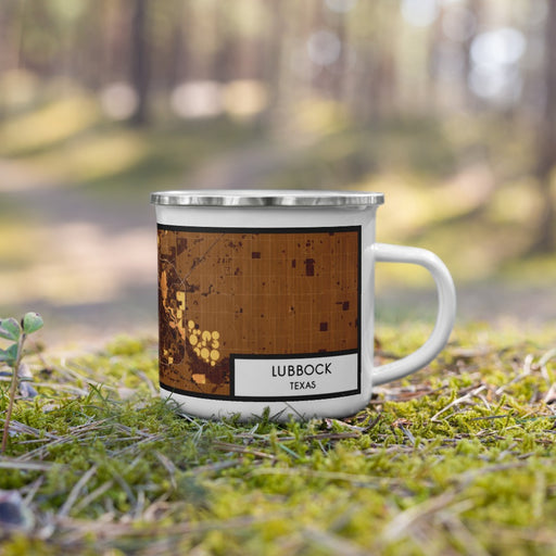 Right View Custom Lubbock Texas Map Enamel Mug in Ember on Grass With Trees in Background