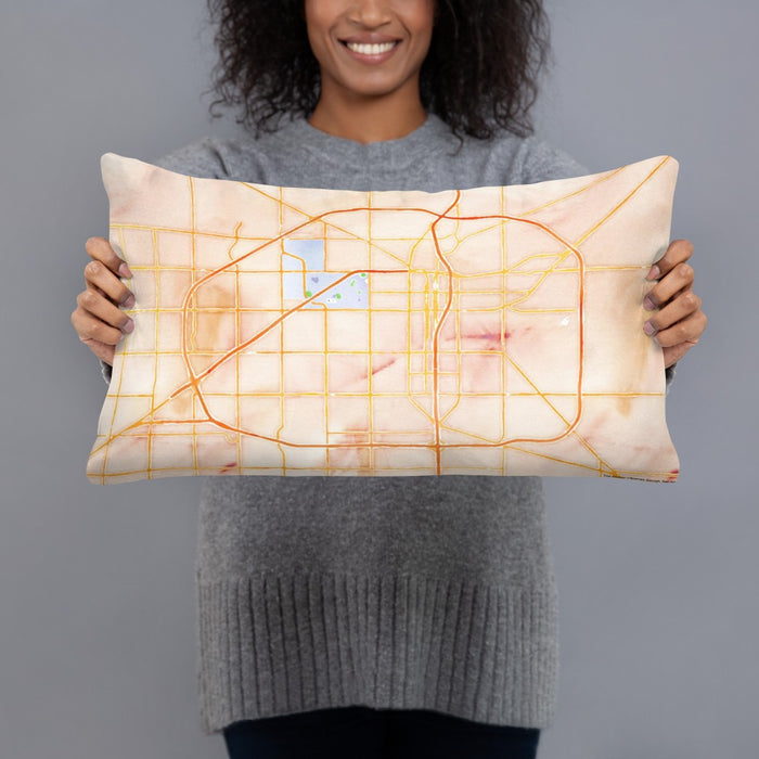 Person holding 20x12 Custom Lubbock Texas Map Throw Pillow in Watercolor
