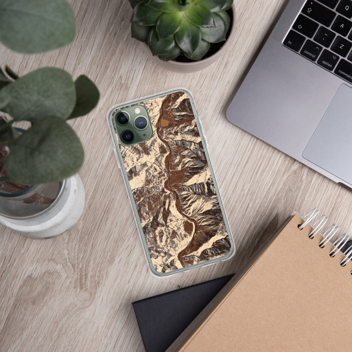 Custom Lucile Idaho Map Phone Case in Ember on Table with Laptop and Plant
