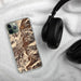 Custom Lucile Idaho Map Phone Case in Ember on Table with Black Headphones