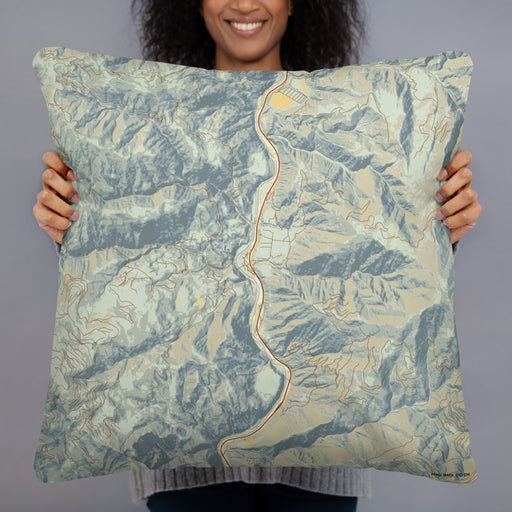 Person holding 22x22 Custom Lucile Idaho Map Throw Pillow in Woodblock