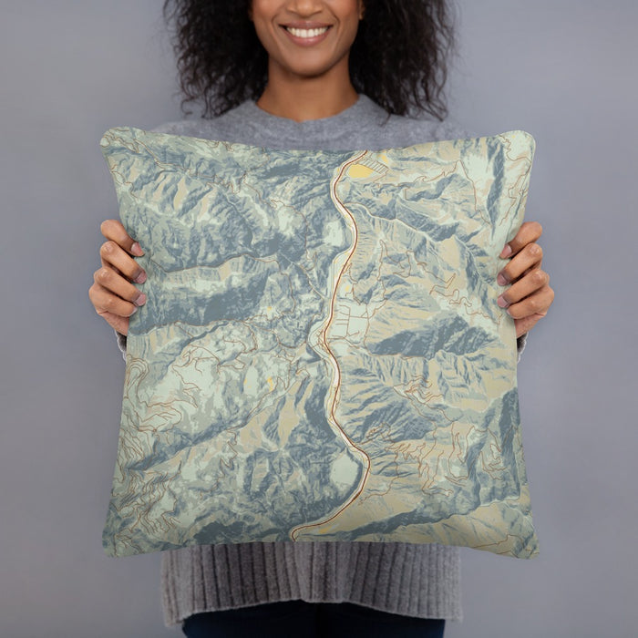Person holding 18x18 Custom Lucile Idaho Map Throw Pillow in Woodblock