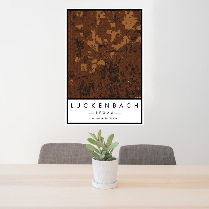24x36 Luckenbach Texas Map Print Portrait Orientation in Ember Style Behind 2 Chairs Table and Potted Plant