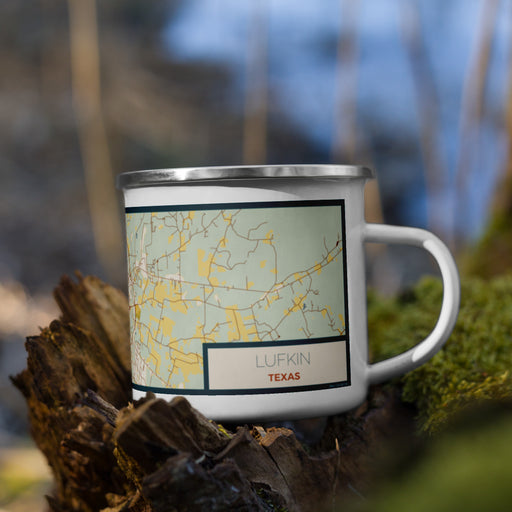 Right View Custom Lufkin Texas Map Enamel Mug in Woodblock on Grass With Trees in Background