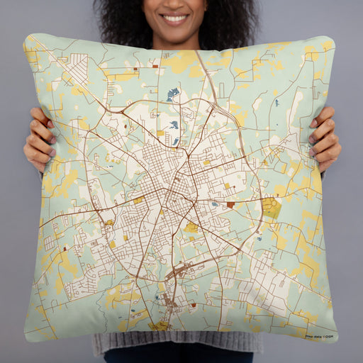 Person holding 22x22 Custom Lufkin Texas Map Throw Pillow in Woodblock