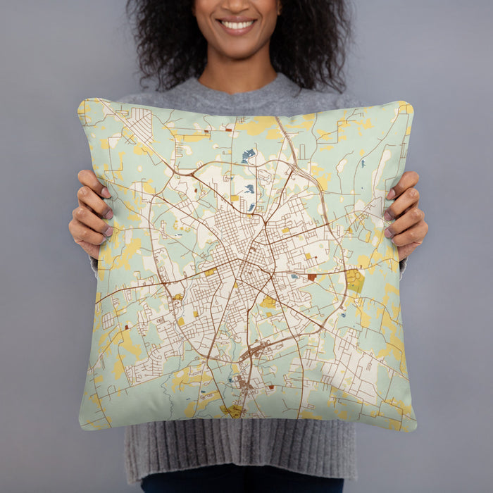 Person holding 18x18 Custom Lufkin Texas Map Throw Pillow in Woodblock