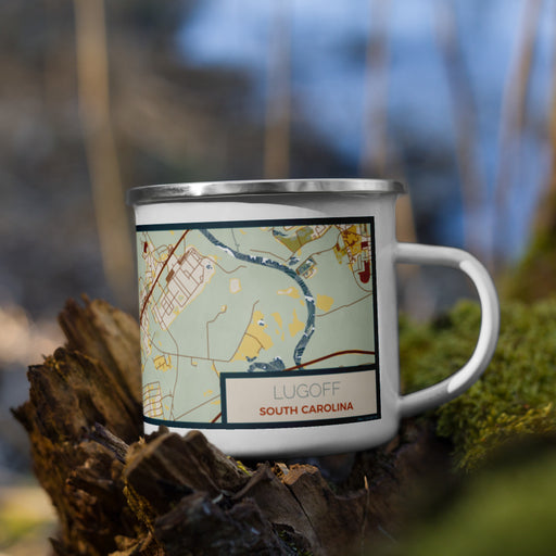 Right View Custom Lugoff South Carolina Map Enamel Mug in Woodblock on Grass With Trees in Background