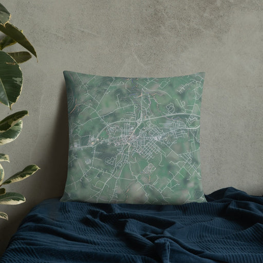 Custom Luray Virginia Map Throw Pillow in Afternoon on Bedding Against Wall