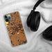 Custom Luray Virginia Map Phone Case in Ember on Table with Black Headphones