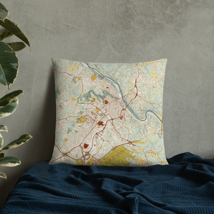 Custom Lynchburg Virginia Map Throw Pillow in Woodblock on Bedding Against Wall