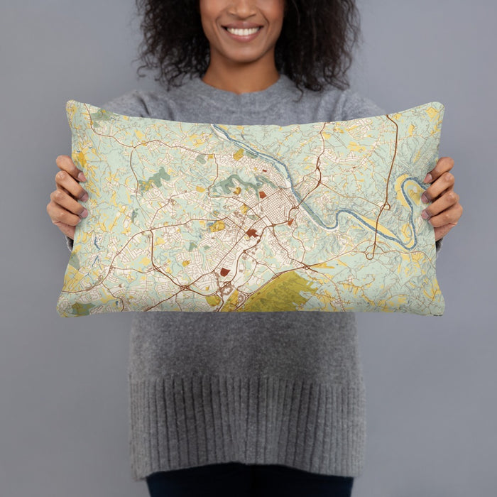 Person holding 20x12 Custom Lynchburg Virginia Map Throw Pillow in Woodblock