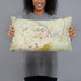 Person holding 20x12 Custom Lynchburg Virginia Map Throw Pillow in Woodblock