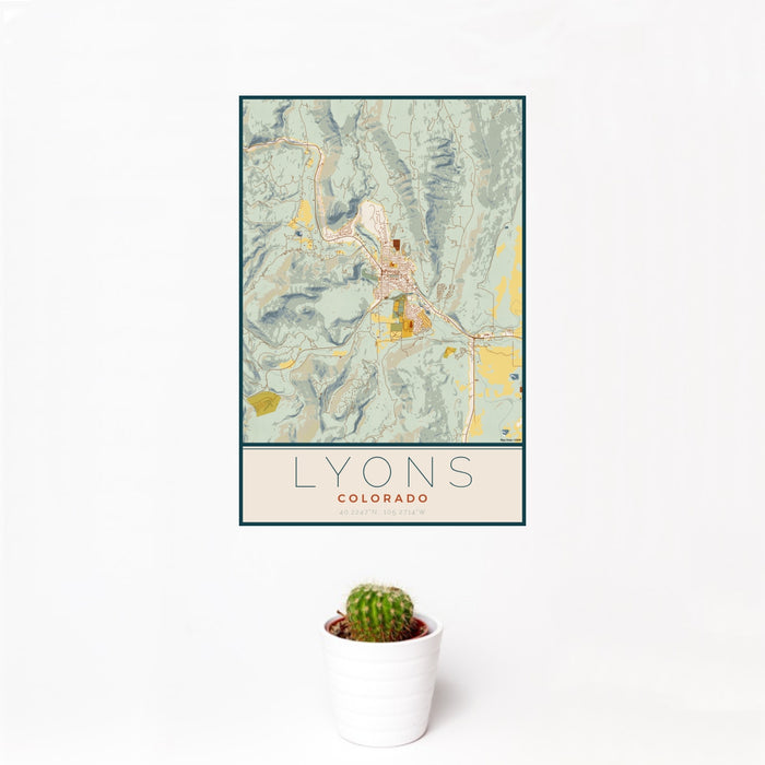 12x18 Lyons Colorado Map Print Portrait Orientation in Woodblock Style With Small Cactus Plant in White Planter