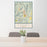 24x36 Lyons Colorado Map Print Portrait Orientation in Woodblock Style Behind 2 Chairs Table and Potted Plant