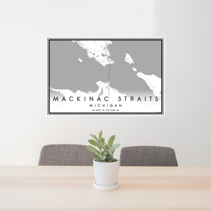 24x36 Mackinac Straits Michigan Map Print Lanscape Orientation in Classic Style Behind 2 Chairs Table and Potted Plant