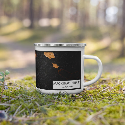 Right View Custom Mackinac Straits Michigan Map Enamel Mug in Ember on Grass With Trees in Background