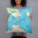 Person holding 18x18 Custom Mackinac Straits Michigan Map Throw Pillow in Watercolor