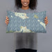 Person holding 20x12 Custom Mackinac Straits Michigan Map Throw Pillow in Woodblock