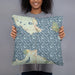 Person holding 18x18 Custom Mackinac Straits Michigan Map Throw Pillow in Woodblock