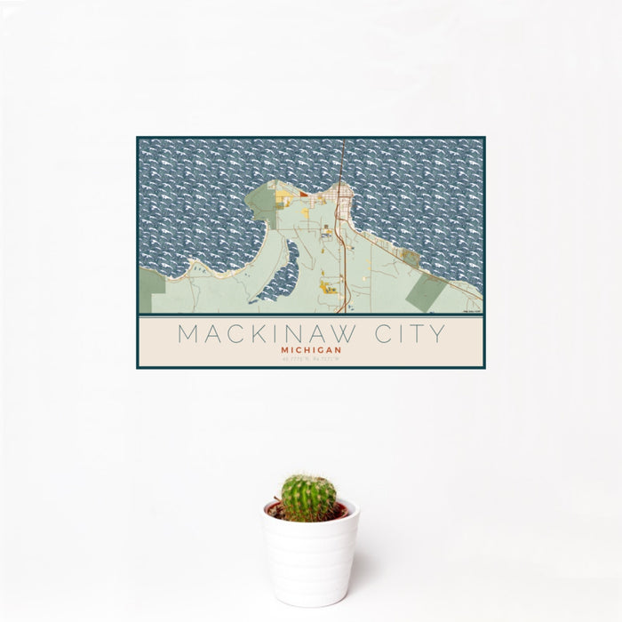12x18 Mackinaw City Michigan Map Print Landscape Orientation in Woodblock Style With Small Cactus Plant in White Planter
