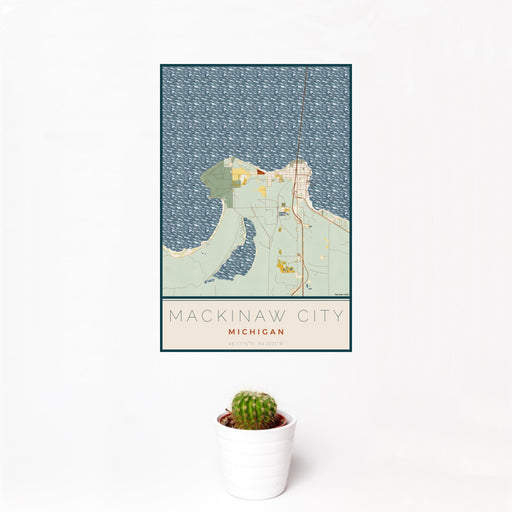 12x18 Mackinaw City Michigan Map Print Portrait Orientation in Woodblock Style With Small Cactus Plant in White Planter
