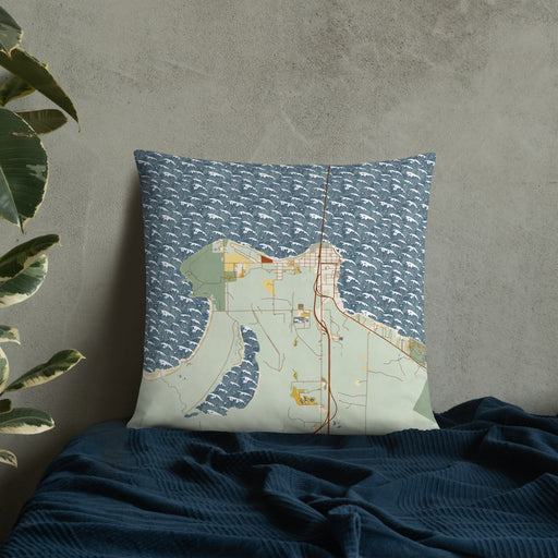 Custom Mackinaw City Michigan Map Throw Pillow in Woodblock on Bedding Against Wall