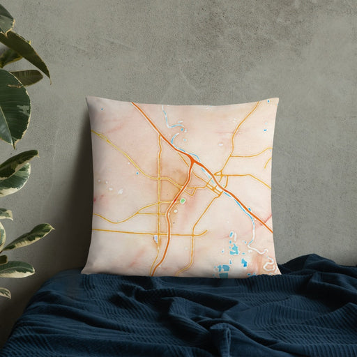 Custom Macon Georgia Map Throw Pillow in Watercolor on Bedding Against Wall