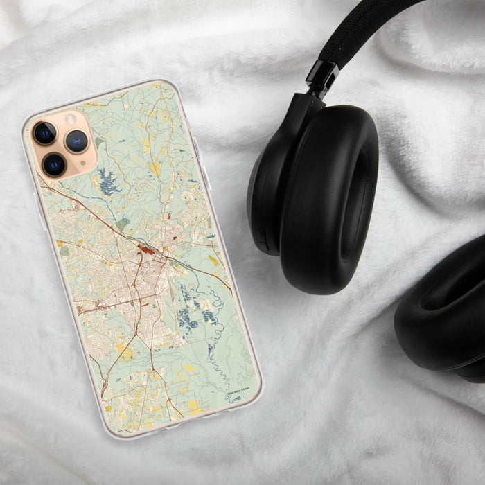 Custom Macon Georgia Map Phone Case in Woodblock on Table with Black Headphones