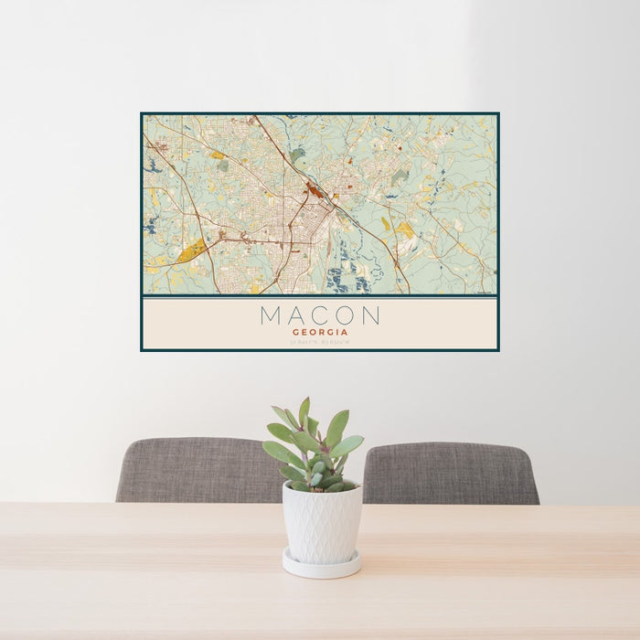 24x36 Macon Georgia Map Print Landscape Orientation in Woodblock Style Behind 2 Chairs Table and Potted Plant