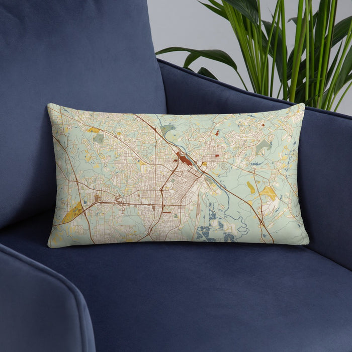 Custom Macon Georgia Map Throw Pillow in Woodblock on Blue Colored Chair