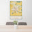 24x36 Madera California Map Print Portrait Orientation in Woodblock Style Behind 2 Chairs Table and Potted Plant