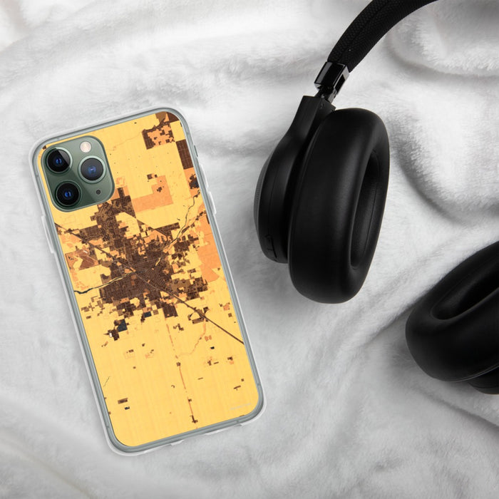 Custom Madera California Map Phone Case in Ember on Table with Black Headphones