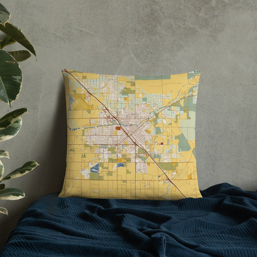 Custom Madera California Map Throw Pillow in Woodblock on Bedding Against Wall