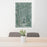 24x36 Madison Alabama Map Print Portrait Orientation in Afternoon Style Behind 2 Chairs Table and Potted Plant