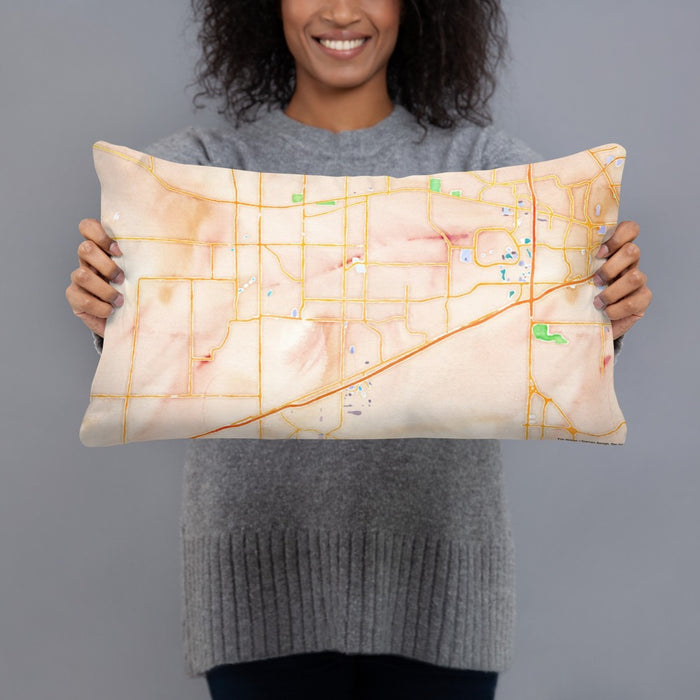 Person holding 20x12 Custom Madison Alabama Map Throw Pillow in Watercolor