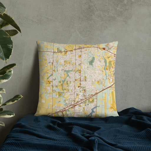 Custom Madison Alabama Map Throw Pillow in Woodblock on Bedding Against Wall