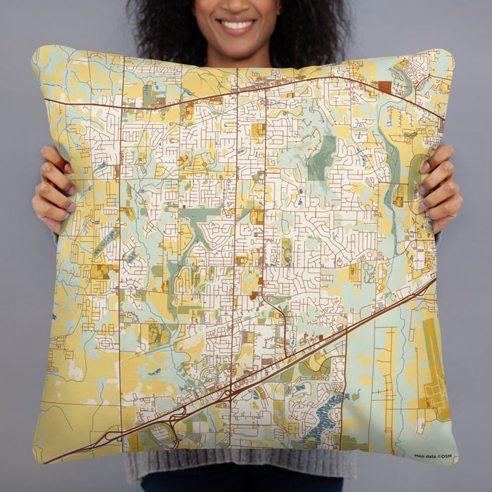 Person holding 22x22 Custom Madison Alabama Map Throw Pillow in Woodblock