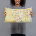 Person holding 20x12 Custom Madison Alabama Map Throw Pillow in Woodblock