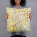 Person holding 18x18 Custom Madison Alabama Map Throw Pillow in Woodblock