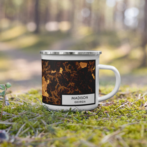 Right View Custom Madison Georgia Map Enamel Mug in Ember on Grass With Trees in Background