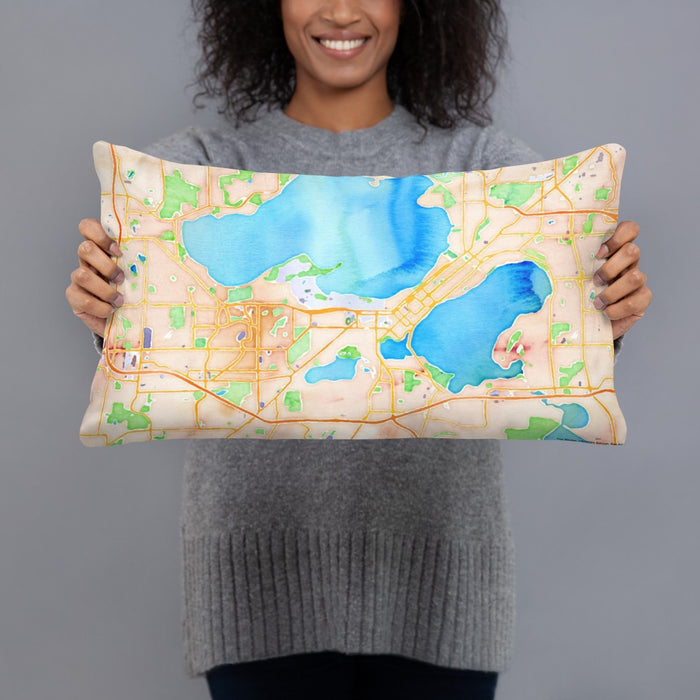 Person holding 20x12 Custom Madison Wisconsin Map Throw Pillow in Watercolor