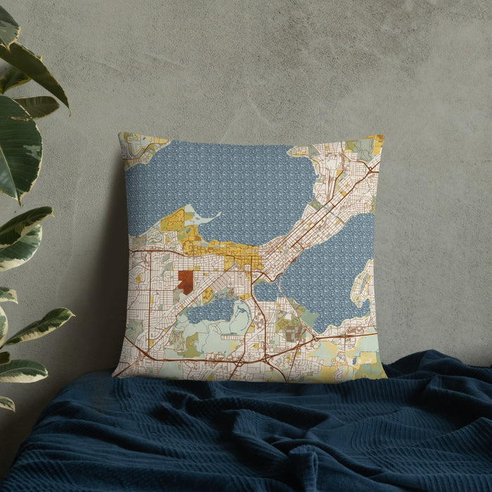 Custom Madison Wisconsin Map Throw Pillow in Woodblock on Bedding Against Wall